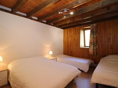Un ou plusieurs lits dans un hébergement de l'établissement Beau Duplex T3 avec Balcon, Wifi et Parking à 300m du Centre - FR-1-608-16