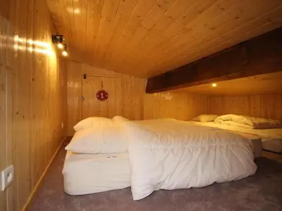 Un ou plusieurs lits dans un hébergement de l'établissement Duplex T3 Hyper Centre Mont-Dore avec WiFi - FR-1-608-1