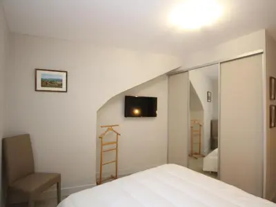 Un ou plusieurs lits dans un hébergement de l'établissement Mont-Dore : Appartement Centre T3 avec Wifi - FR-1-608-28
