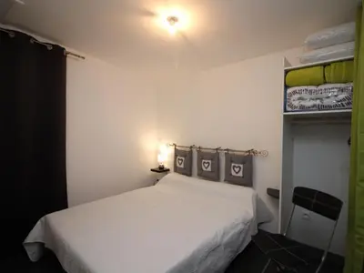 Un ou plusieurs lits dans un hébergement de l'établissement Beau T3 avec WIFI au centre du Mont-Dore, proche des Thermes - FR-1-608-49
