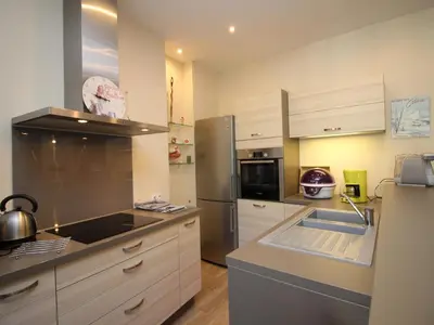 Cuisine ou kitchenette dans l'établissement LE MONT DORE - Appartement T3 spacieux avec balcon et WIFI au centre - FR-1-608-23