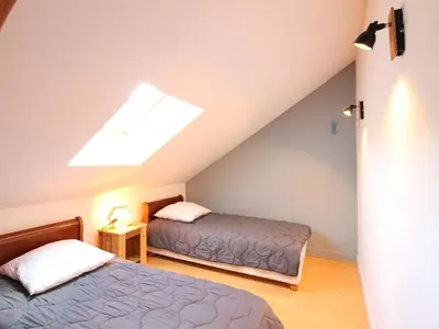 Un ou plusieurs lits dans un hébergement de l'établissement Appartement Duplex Agréable, Proche du Centre - FR-1-608-44