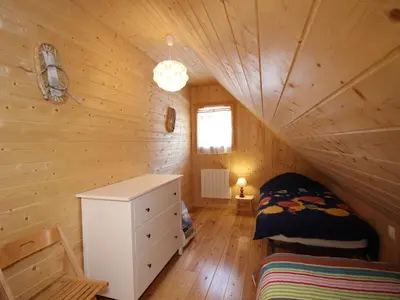 Un ou plusieurs lits dans un hébergement de l'établissement Chalet 4* avec Terrasse Panoramique, WiFi et Parking, 8 Pers. - FR-1-608-15
