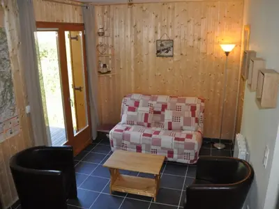 Coin salon dans l'établissement Chalet de Luxe 4* au Mont-Dore - WIFI Inclus - FR-1-608-31
