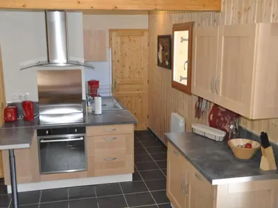Cuisine ou kitchenette dans l'établissement Chalet de Luxe 4* au Mont-Dore - WIFI Inclus - FR-1-608-31