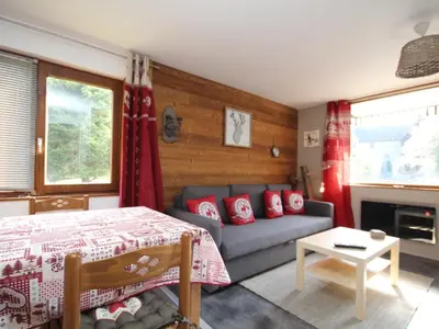 Un ou plusieurs lits dans un hébergement de l'établissement Charmant T2 avec balcon au Mont Dore, parking inclus - FR-1-608-135