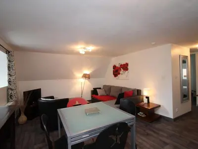 Coin salon dans l'établissement T3 au Mont-Dore avec Wi-Fi, à 400m du centre - FR-1-608-50