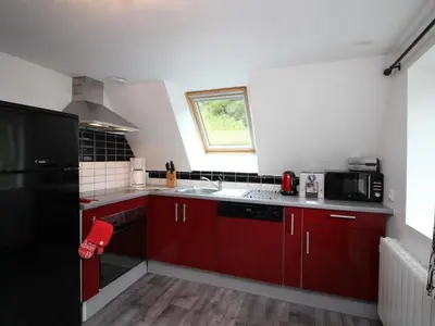 Cuisine ou kitchenette dans l'établissement T3 au Mont-Dore avec Wi-Fi, à 400m du centre - FR-1-608-50
