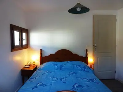 Un ou plusieurs lits dans un hébergement de l'établissement Maison au Mont-Dore avec jardin clos, idéale pour 10 personnes - FR-1-608-120