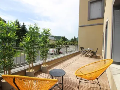 Balcon ou terrasse dans l'établissement LE MONT DORE - Appartement T3 avec terrasse, parking et wifi - FR-1-608-79