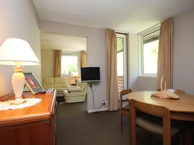 Télévision ou salle de divertissement dans l'établissement Spacieux duplex 3 pièces avec balcon et parking privatif - FR-1-608-161
