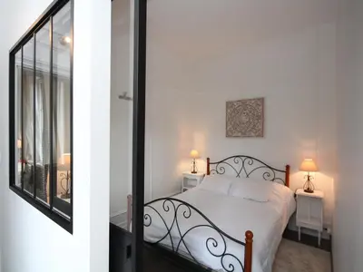 Un ou plusieurs lits dans un hébergement de l'établissement Charmant T3 avec Balcon au Mont-Dore, WiFi, Proche Centre - FR-1-608-155