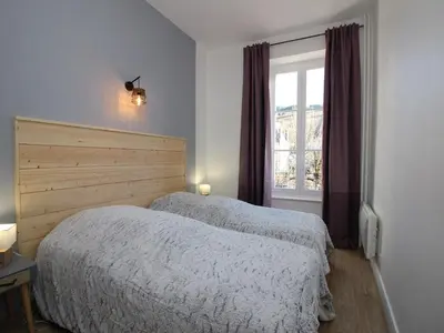 Un ou plusieurs lits dans un hébergement de l'établissement La Bourboule - Charmant T2 rénové avec WiFi - FR-1-608-159
