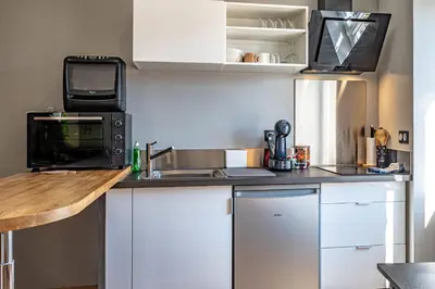 Cuisine ou kitchenette dans l'établissement SOTHYS Design Apartment 7 min from Limoges