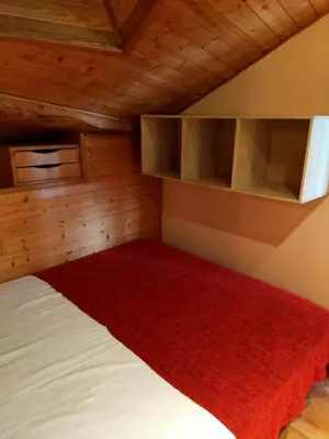 Un ou plusieurs lits dans un hébergement de l'établissement Duplex de 65 m² à l'esprit chalet