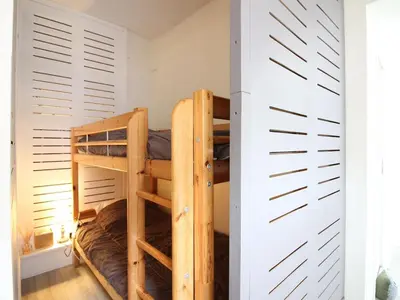 Un ou plusieurs lits superposés dans un hébergement de l'établissement Mont-Dore Centre - Charmant T2 Bis avec WIFI - FR-1-608-47