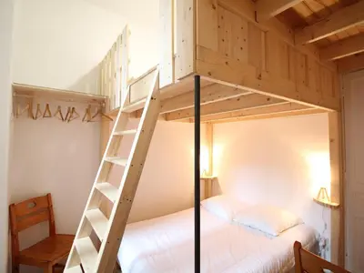 Un ou plusieurs lits dans un hébergement de l'établissement T2 agréable au Mont-Dore avec Wifi - FR-1-608-197