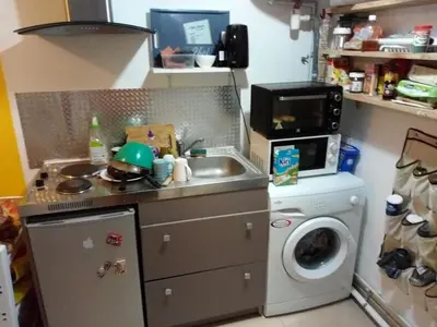 Cuisine ou kitchenette dans l'établissement Studio charmant tout équipé