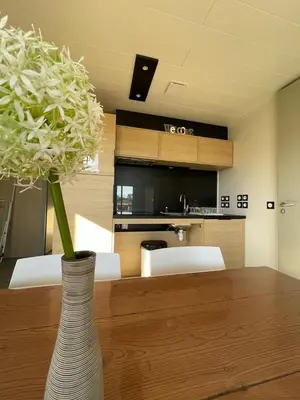 Cuisine ou kitchenette dans l'établissement Auvergne chalets Sancy