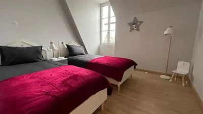 Un ou plusieurs lits dans un hébergement de l'établissement Les Maisons du Périgord Côté 50