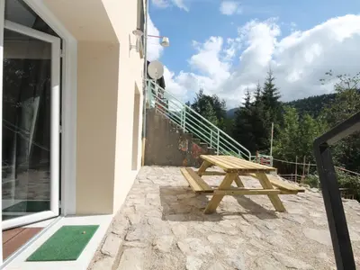 Balcon ou terrasse dans l'établissement Le Mont-Dore T2 Bis avec Terrasse Ouest et Wi-Fi - FR-1-608-70