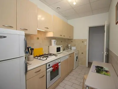 Cuisine ou kitchenette dans l'établissement Appartement lumineux T4, proche centre et thermes, La Bourboule - FR-1-608-11