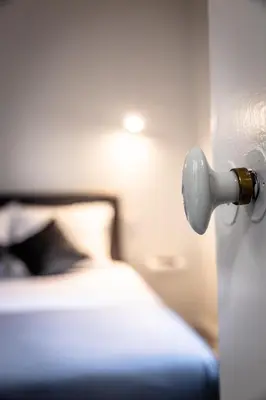 Un ou plusieurs lits dans un hébergement de l'établissement La Dame de Coeur - 1 chambre