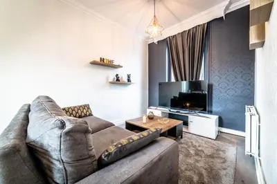 Coin salon dans l'établissement Le Temps Éternel - 1 chambre