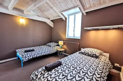 Un ou plusieurs lits dans un hébergement de l'établissement Splendide Maison 5 chambres ! Quartier Historique