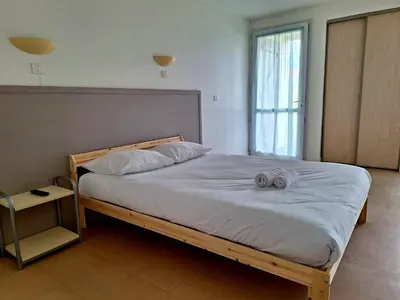 Un ou plusieurs lits dans un hébergement de l'établissement Hôtel Eden Lake