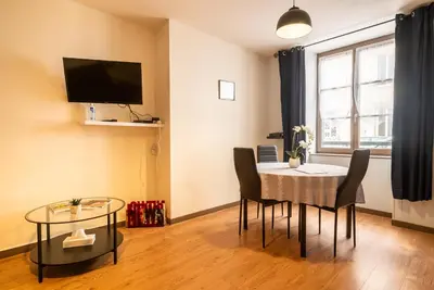 Télévision ou salle de divertissement dans l'établissement Le LENNON - Centre Ville T2 - Rez-de-chaussée