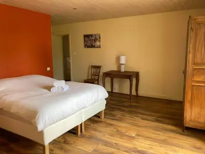 Un ou plusieurs lits dans un hébergement de l'établissement Maison de charme en Périgord 10 personnes La maison d'Albertine
