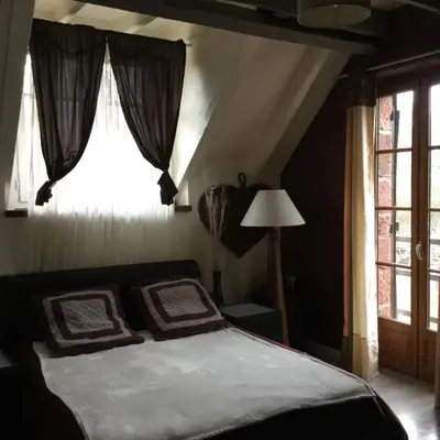 Un ou plusieurs lits dans un hébergement de l'établissement Luxe,piscine,jacuzzi,moulin historique en pierres entièrement rénové