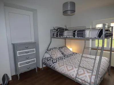 Un ou plusieurs lits dans un hébergement de l'établissement Charmante maison en pierres à Coly - FR-1-616-19