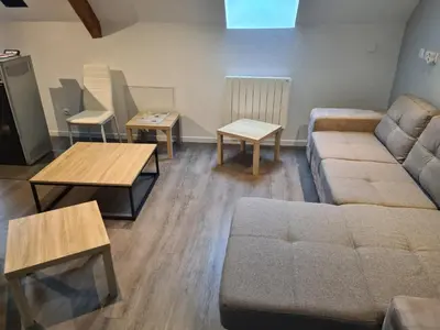 Coin salon dans l'établissement Gite de Murat