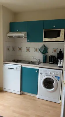 Cuisine ou kitchenette dans l'établissement Grand appartement hyper centre haut standing