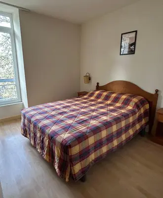 Un ou plusieurs lits dans un hébergement de l'établissement Grand appartement hyper centre haut standing