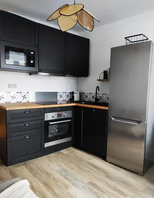 Cuisine ou kitchenette dans l'établissement L'escapade