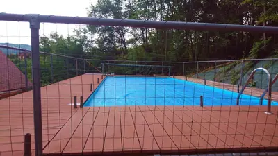 Piscine de l'établissement Het gevoel van vrijheid tussen bos en dorp ou située à proximité