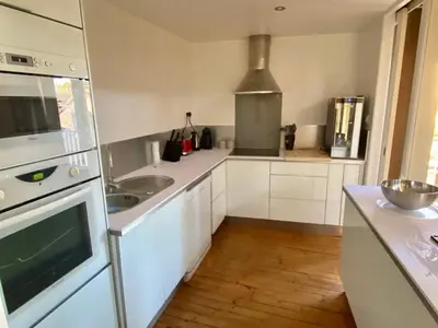 Cuisine ou kitchenette dans l'établissement Superbe LOFT centre-ville - Sauna - parking privé -Clim- 1 à 10personnes
