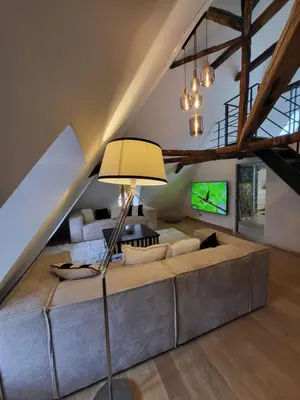 Télévision ou salle de divertissement dans l'établissement LA MAISON 1788