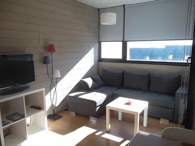 Télévision ou salle de divertissement dans l'établissement Appartement les Myrtilles à Super Besse au pied des pistes