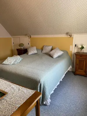 Un ou plusieurs lits dans un hébergement de l'établissement Hôtel de famille L.F.M.A.L.