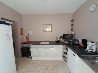 Cuisine ou kitchenette dans l'établissement Au doux refuge