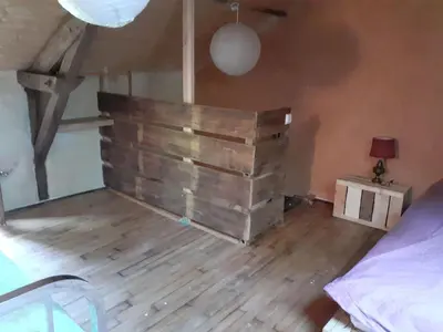 Un ou plusieurs lits dans un hébergement de l'établissement La maison parfumée