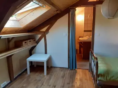 Un ou plusieurs lits dans un hébergement de l'établissement La maison parfumée