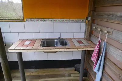 Cuisine ou kitchenette dans l'établissement Chalet met mooi uitzicht