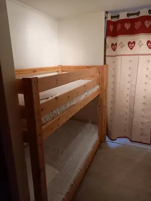 Un ou plusieurs lits dans un hébergement de l'établissement Studio 4 personnes centre Superbesse