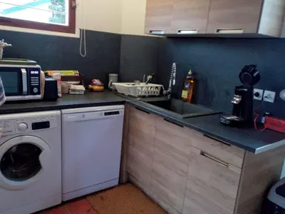 Cuisine ou kitchenette dans l'établissement Chalet Lou Griou