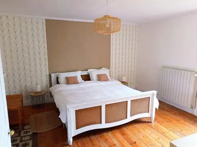 Un ou plusieurs lits dans un hébergement de l'établissement Gîte Les Hauts de Villemaloux